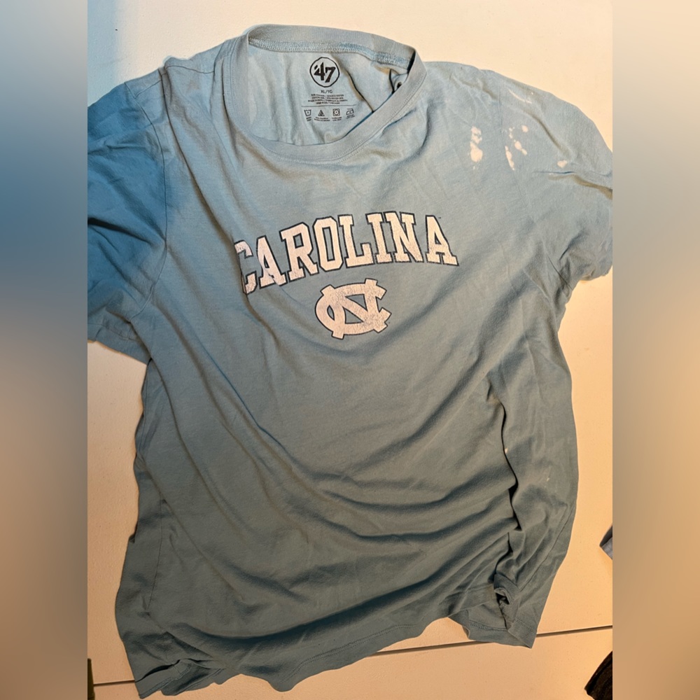 UNC bleach stained shirt